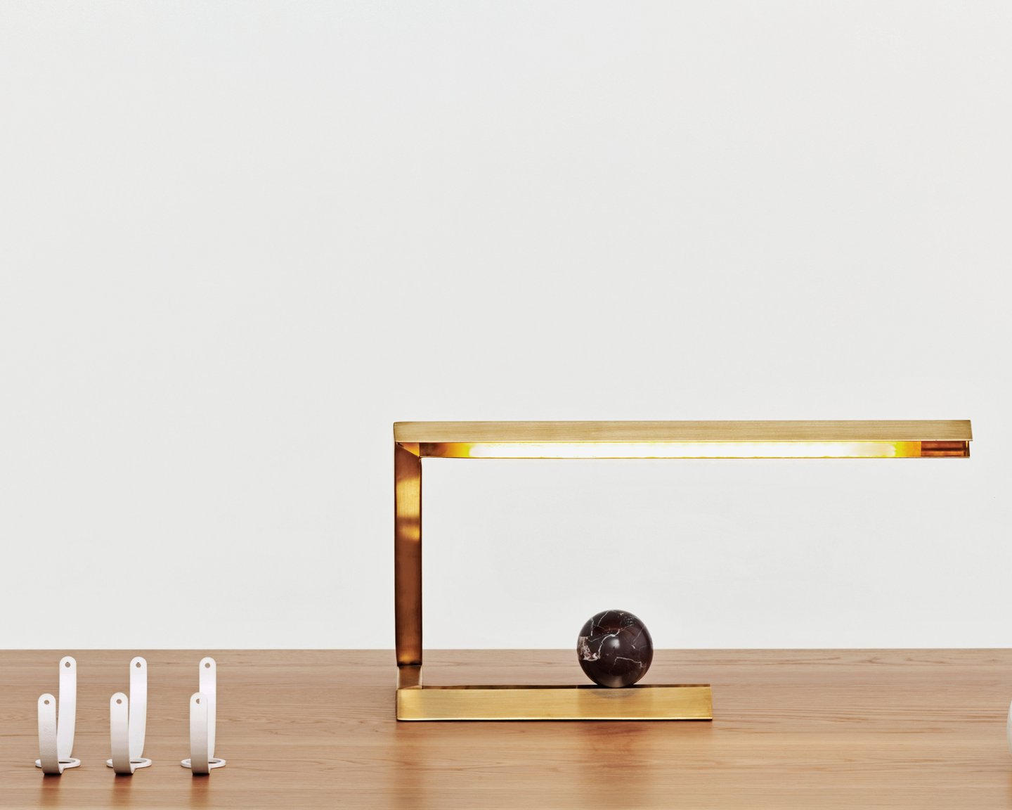 Image: uploads/2017_03/Resident-Oud-table-light-by-Nat-Cheshire-3.jpg