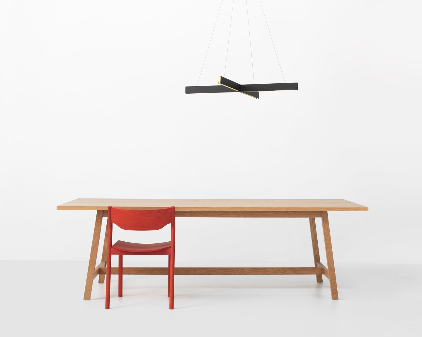 Image: uploads/2017_12/Resident-Cross-pendant---Hawk-table---Tangerine-chair.jpg